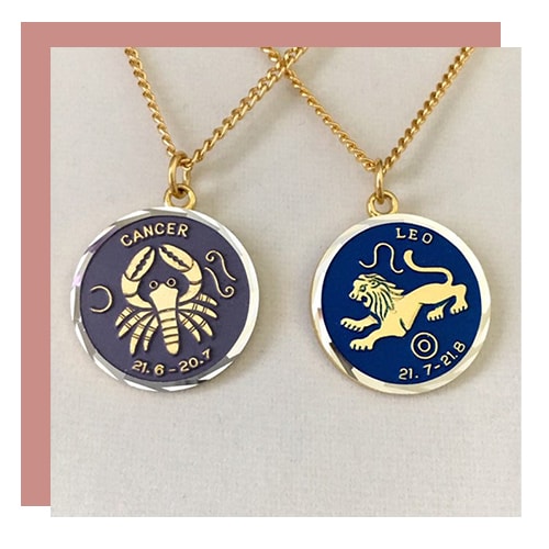 Cancer and leo zodiac pendants