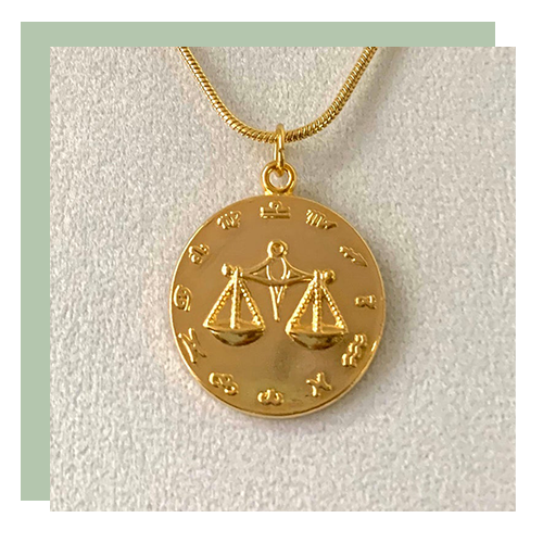 Vintage inspired pendant in gold zodiac
